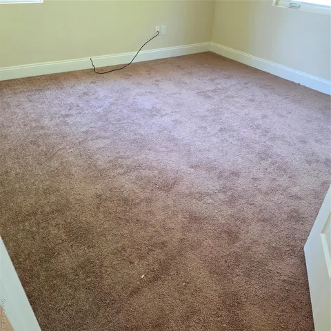 a view of a room with an empty space