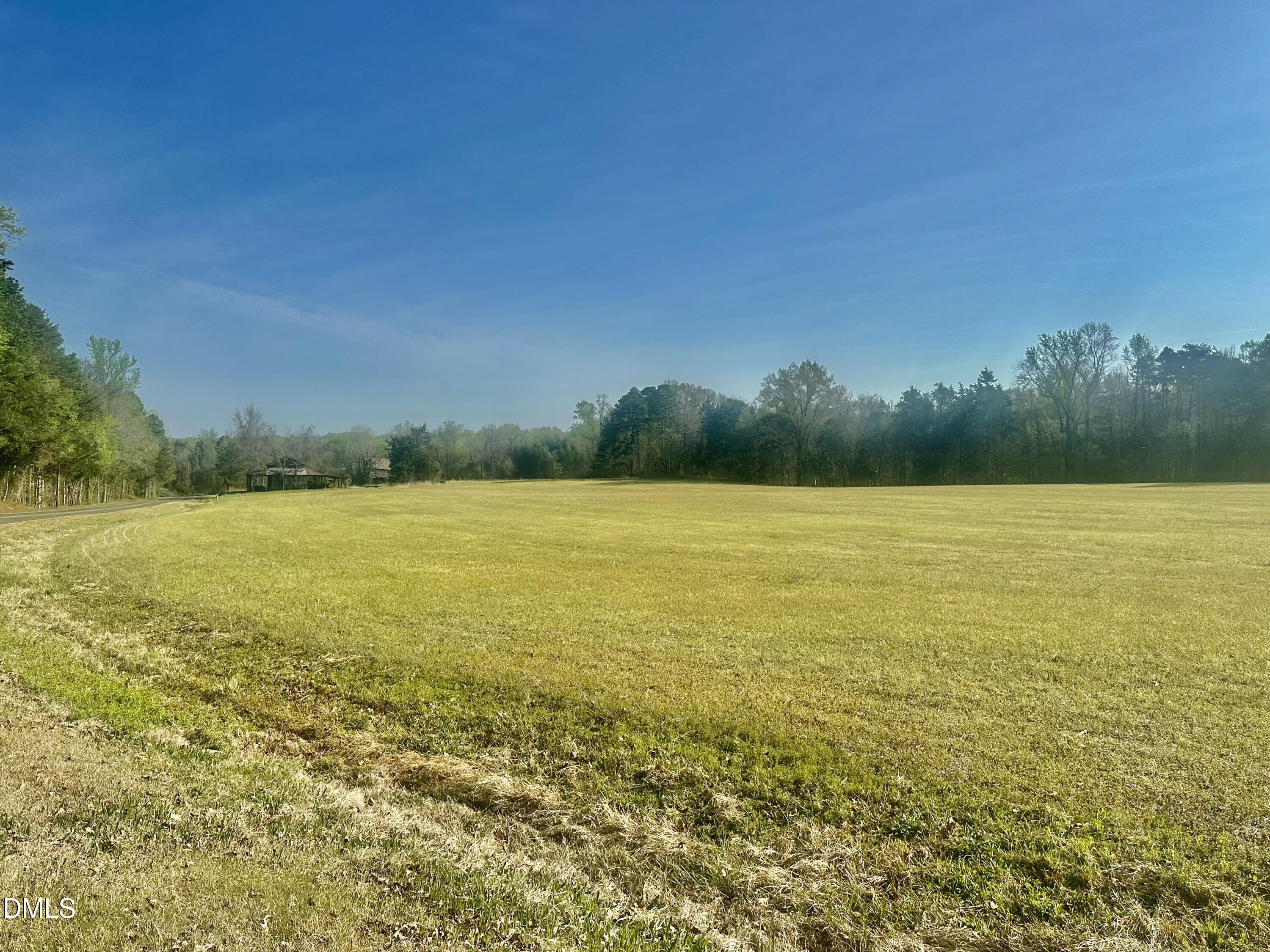 11-acres Skip Rogers Road Hurdle Mills, NC 27541 - Photo 5 of 8 a view of an ocean and beach