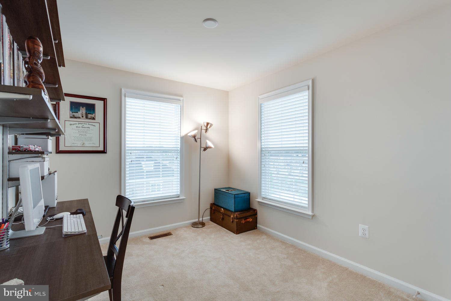 42724 Redpath Terrace Ashburn, VA 20147 - Photo 12 of 17 a room with furniture and a window