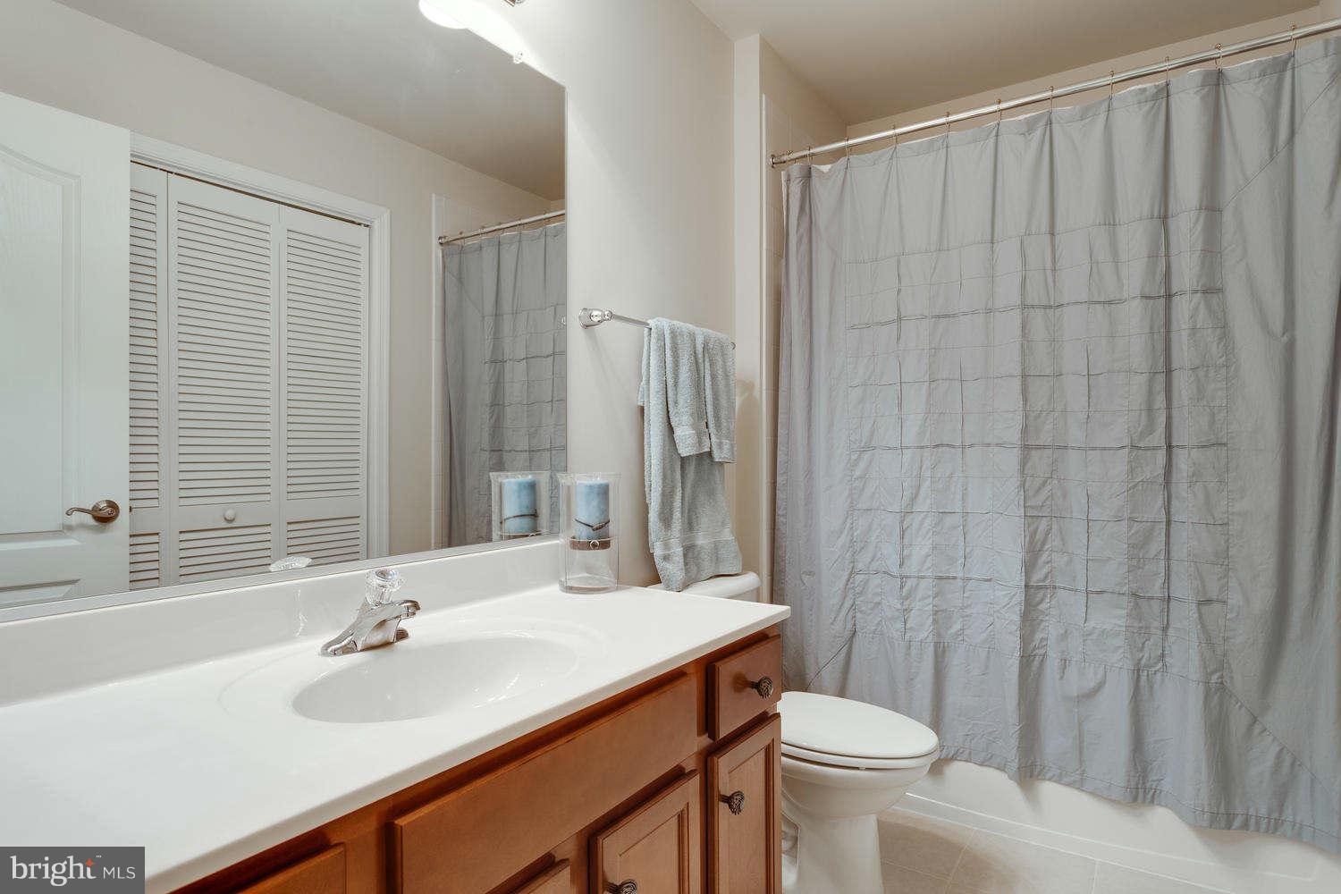 42724 Redpath Terrace Ashburn, VA 20147 - Photo 13 of 17 a bathroom with a sink toilet and shower