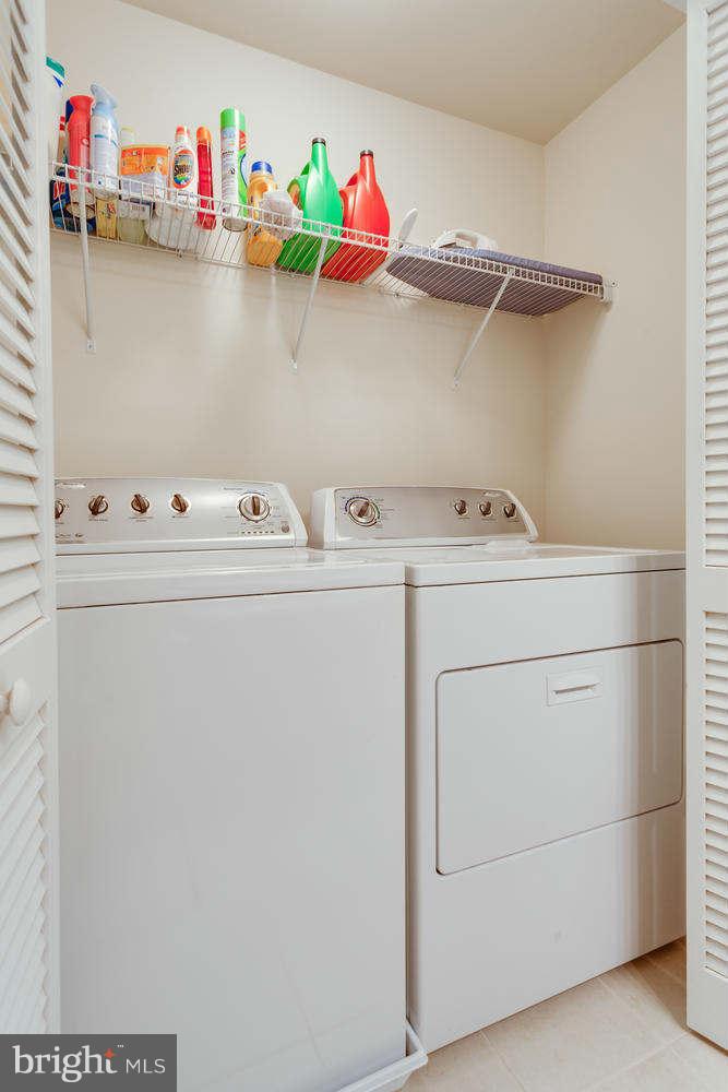42724 Redpath Terrace Ashburn, VA 20147 - Photo 14 of 17 a utility room with dryer and washer