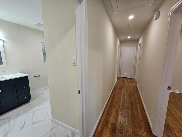 a bathroom with sink and mirror