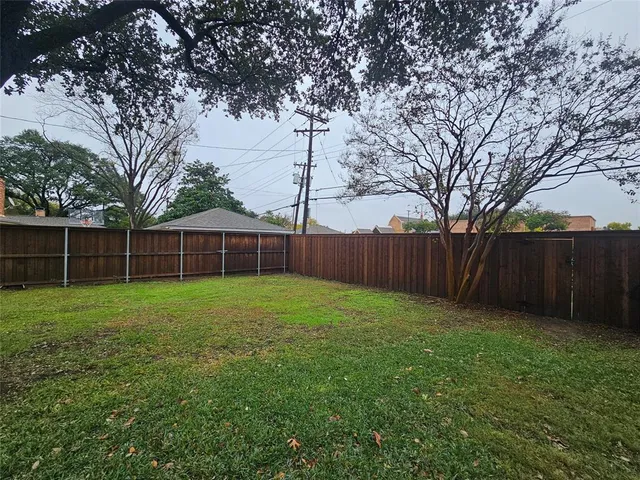 a view of a backyard with a garden