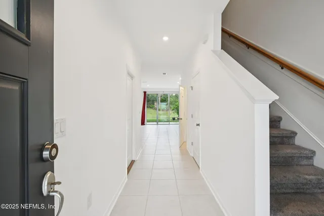 a view of entryway with stairs