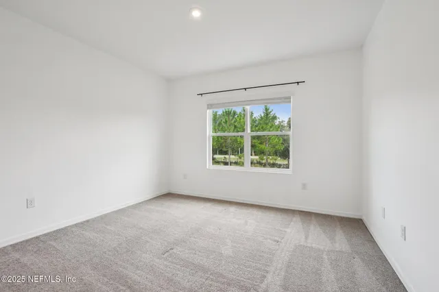 an empty room with window