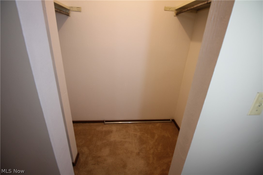 4695 Mayfield Road, Unit D South Euclid, OH 44121 - Photo 11 of 22 Primary suite walk-in closet