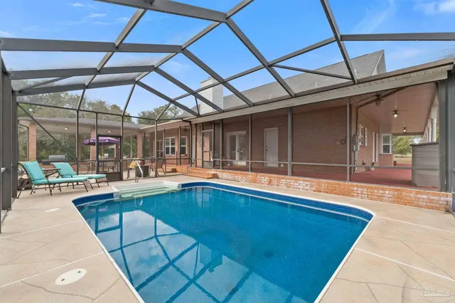 front view of a house with a swimming pool