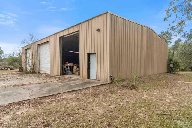 a view of a yard with an ocean
