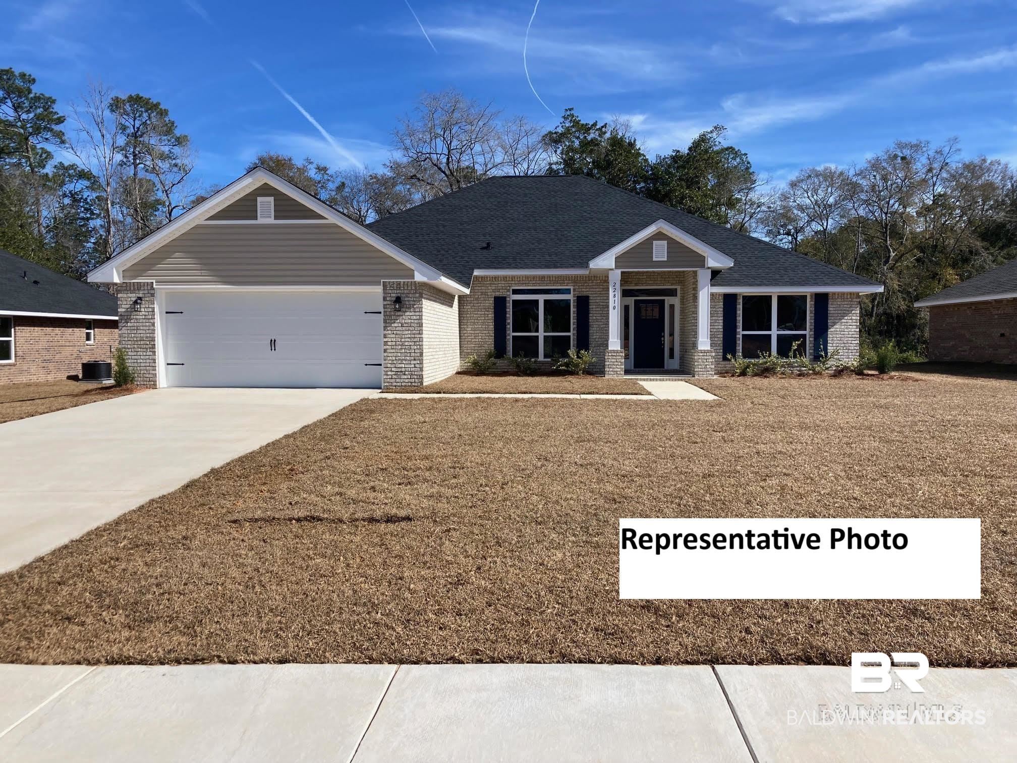 1421 Wilson Avenue Daphne, AL 36526 - Photo 1 of 30 View of front of house featuring cooling unit and a garage