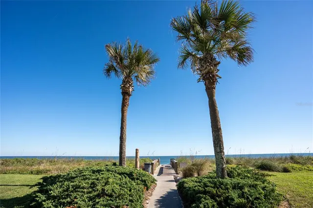 a view of balcony with furniture