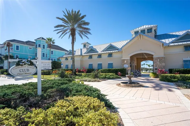a view of a swimming pool with chairs