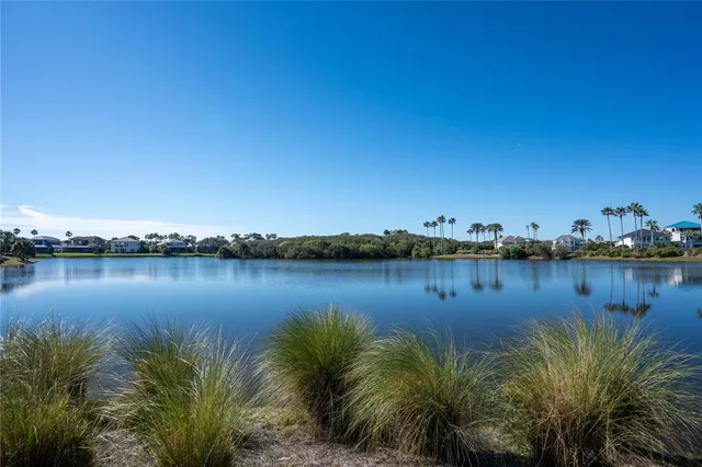 a view of a terrace with a lake view