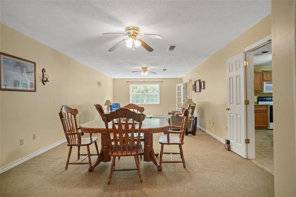 1092 West Highway 199 Springtown, TX 76082 - Photo 6 of 23 a view of a dining room with furniture