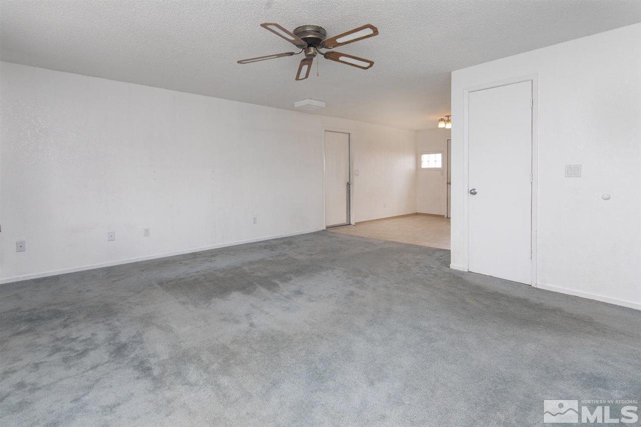 218 Ring Road Dayton, NV 89403 - Photo 4 of 25 a view of a big room with carpet