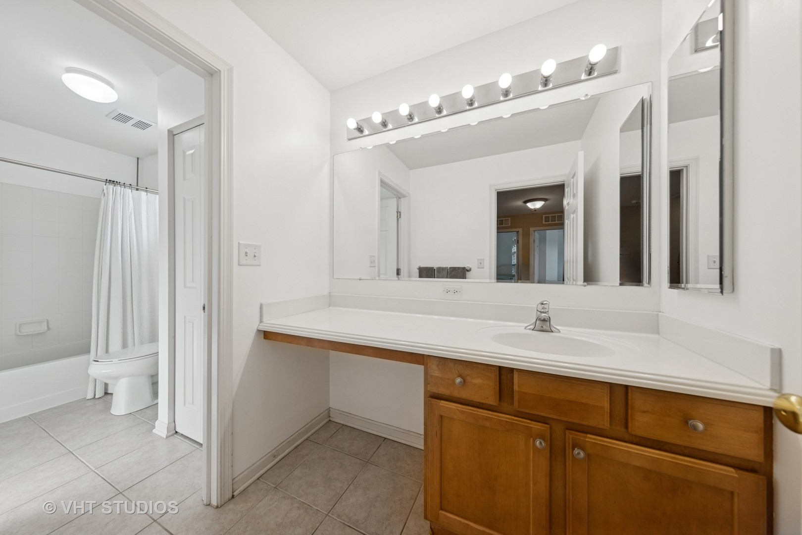 13733 Meadow Lane Plainfield, IL 60544 - Photo 23 of 39 a bathroom with a sink double vanity and a mirror