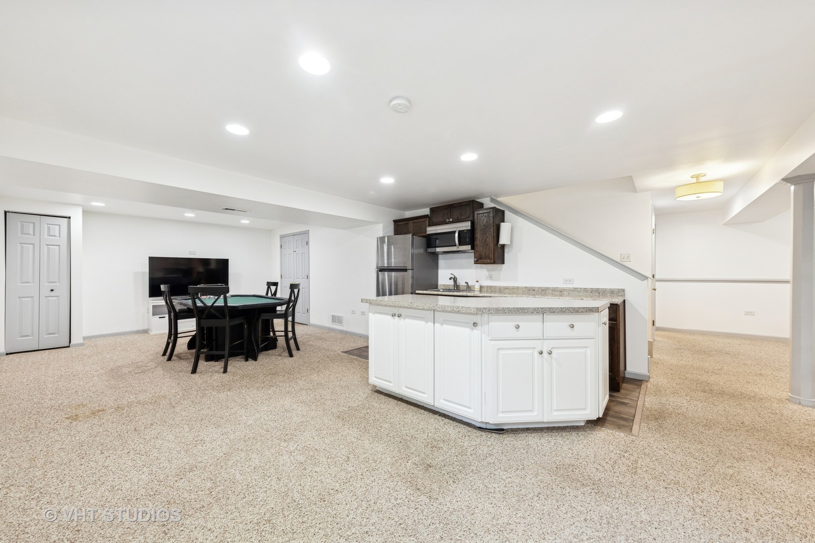 13733 Meadow Lane Plainfield, IL 60544 - Photo 24 of 39 a living room with furniture and a flat screen tv