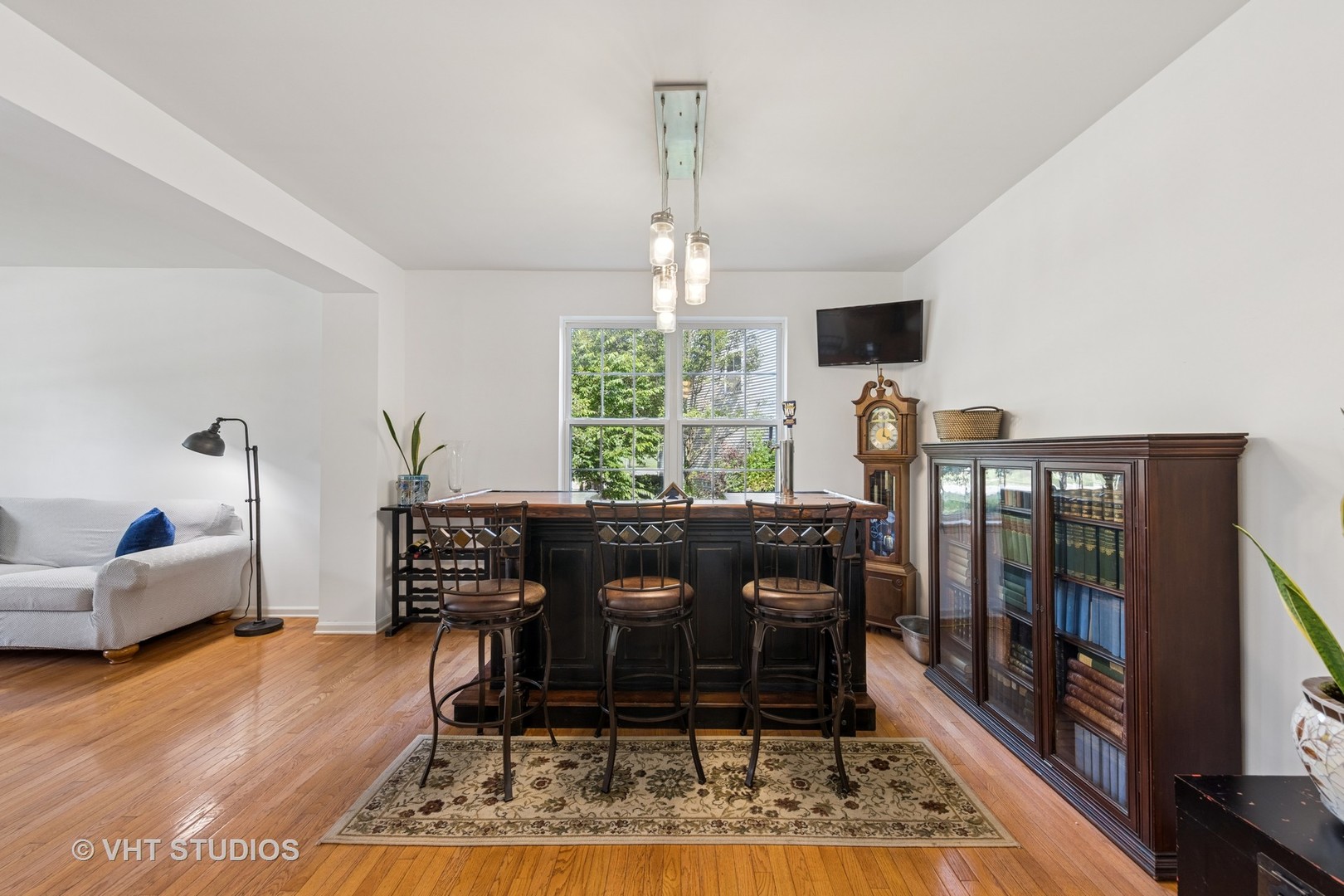 13733 Meadow Lane Plainfield, IL 60544 - Photo 9 of 39 a view of a dining room with furniture window and wooden floor