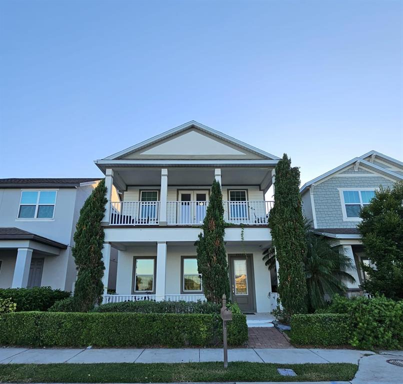 8552 Powder Ridge Trail Windermere, FL 34786 - Photo 13 of 30 a front view of a house with a yard