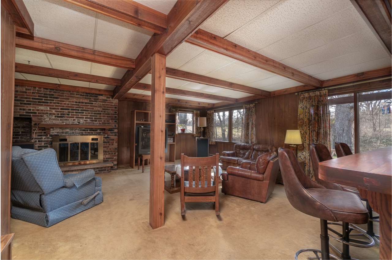 5760 Rotary Road Cherry Valley, IL 61016 - Photo 15 of 25 a living room with furniture and a large window