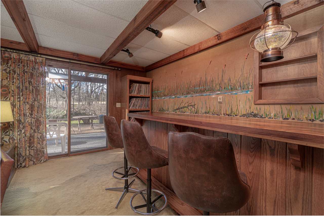 5760 Rotary Road Cherry Valley, IL 61016 - Photo 16 of 25 a view of a room that has a bench in it