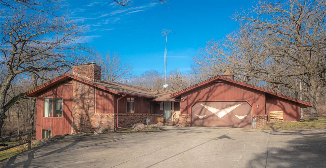 5760 Rotary Road Cherry Valley, IL 61016 - Photo 2 of 25 a view of a house with a yard