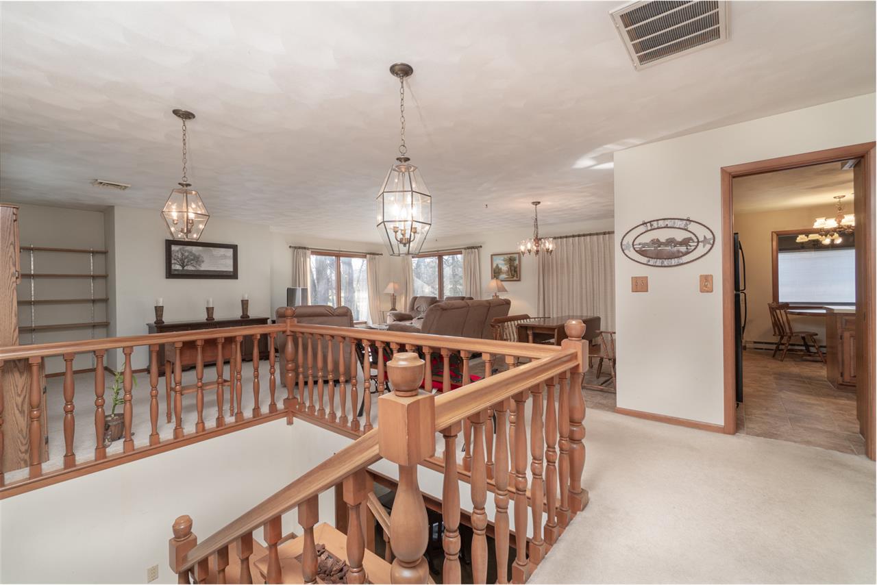 5760 Rotary Road Cherry Valley, IL 61016 - Photo 3 of 25 a view of a room with furniture and windows