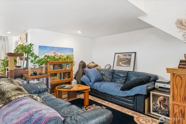a living room with furniture and a couch
