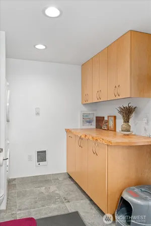 a room with cabinets and window
