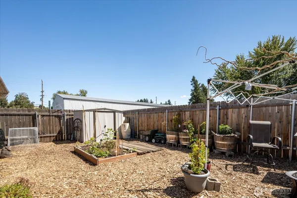 a view of a backyard with patio