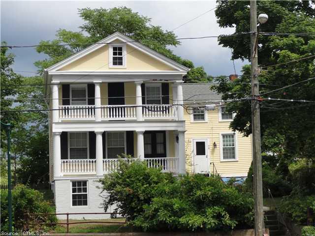 98 High Street Groton, CT 06355 - Photo 1 of 1 a front view of a house with a yard