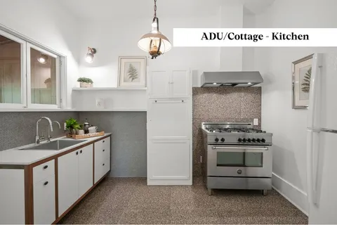 a bedroom with a bed and a lamp