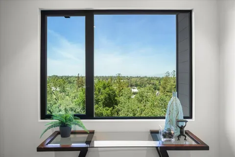a view of a entryway with wooden floor