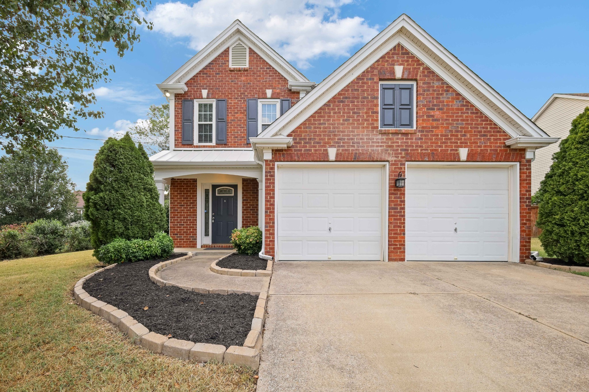 2201 Cardiff Lane Mount Juliet, TN 37122 - Photo 1 of 47 a front view of a house with garden