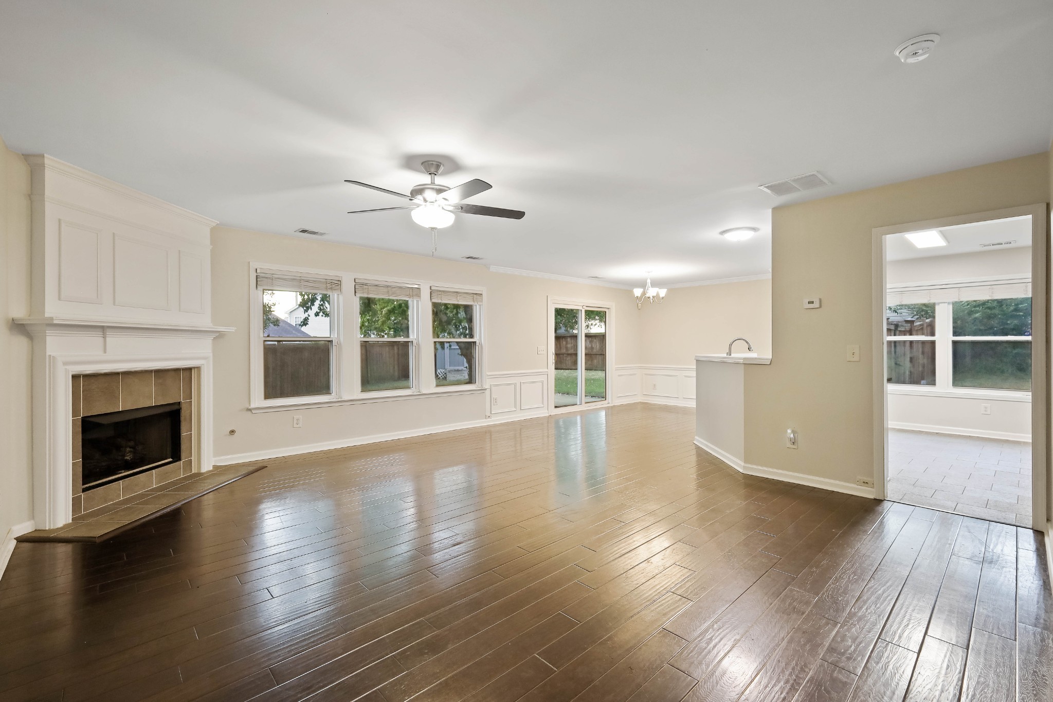 2201 Cardiff Lane Mount Juliet, TN 37122 - Photo 15 of 47 a view of an empty room with wooden floor and a fireplace