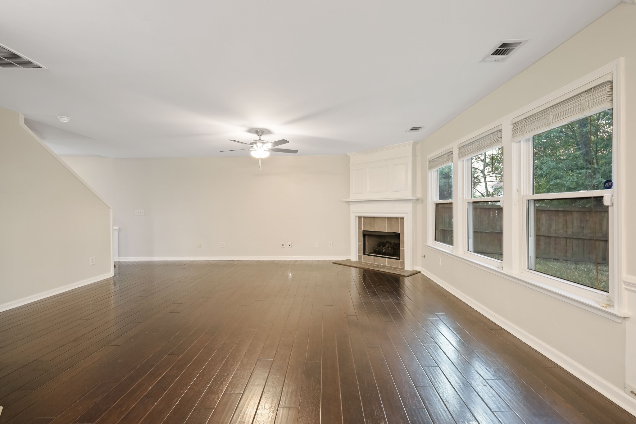 2201 Cardiff Lane Mount Juliet, TN 37122 - Photo 16 of 47 a view of an empty room with wooden floor and a window
