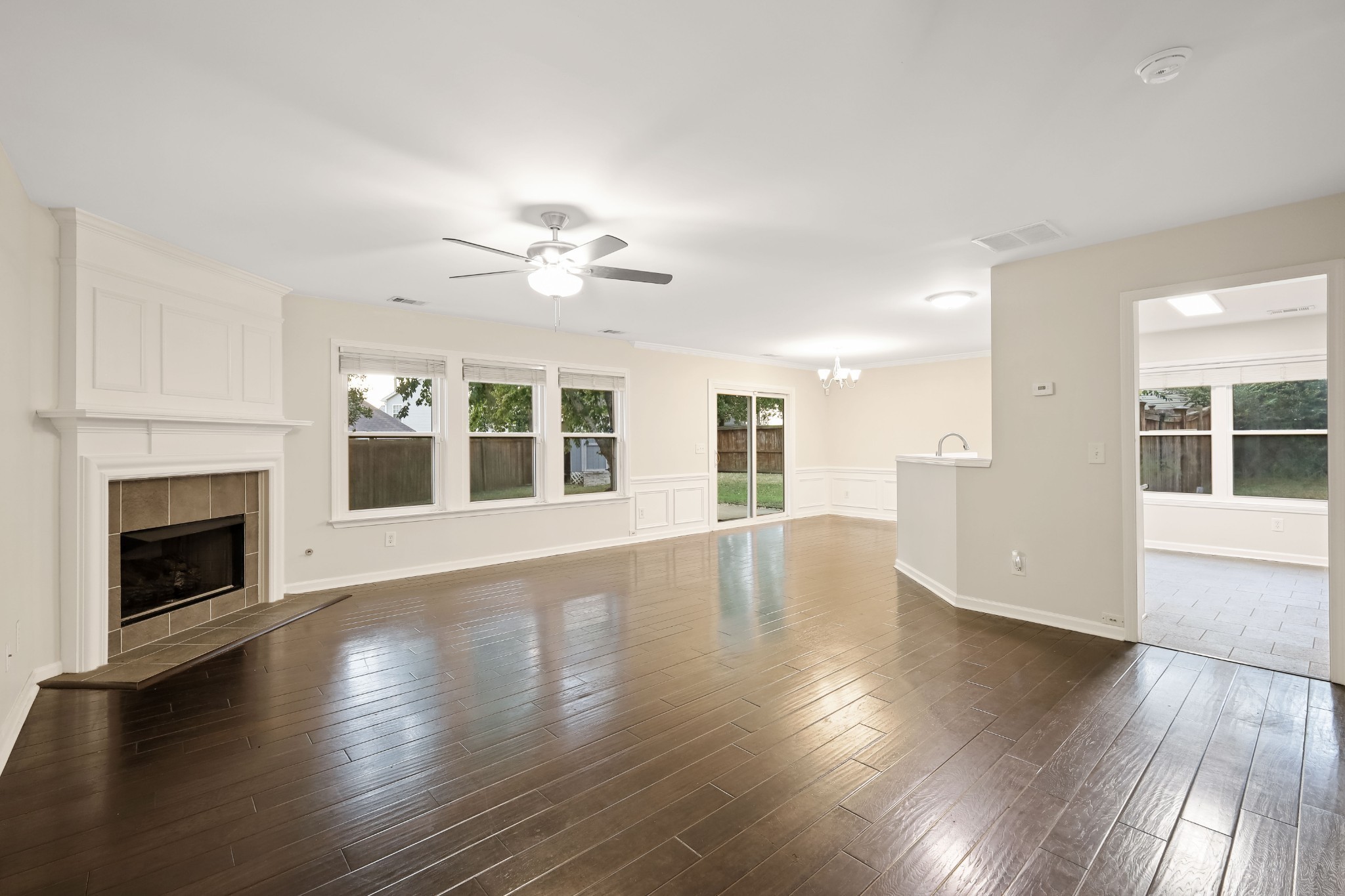 2201 Cardiff Lane Mount Juliet, TN 37122 - Photo 17 of 47 a view of an empty room with wooden floor and a fireplace