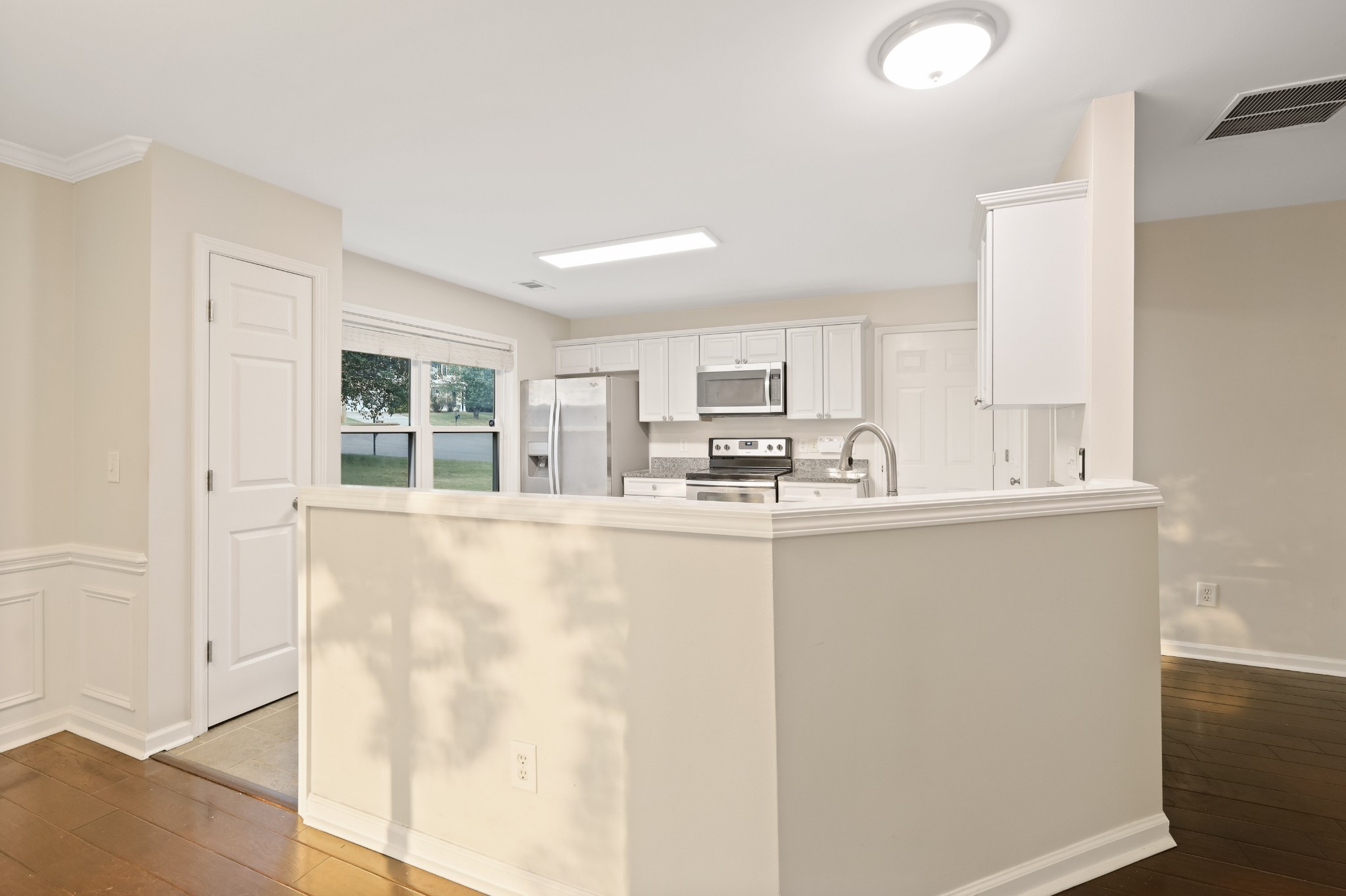 2201 Cardiff Lane Mount Juliet, TN 37122 - Photo 20 of 47 a white refrigerator freezer sitting inside of a kitchen