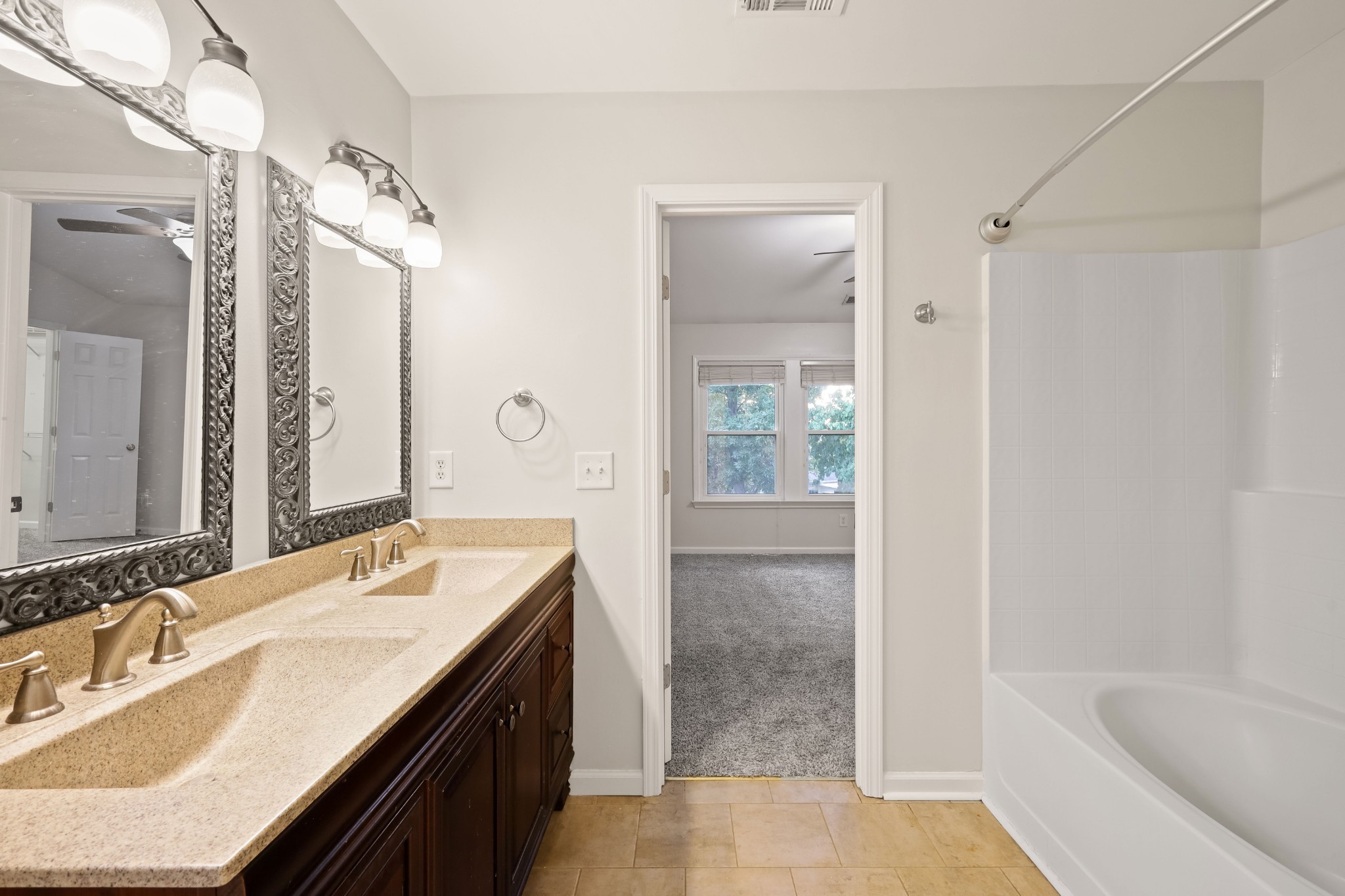 2201 Cardiff Lane Mount Juliet, TN 37122 - Photo 32 of 47 a bath room with a sink vanity tub and shower