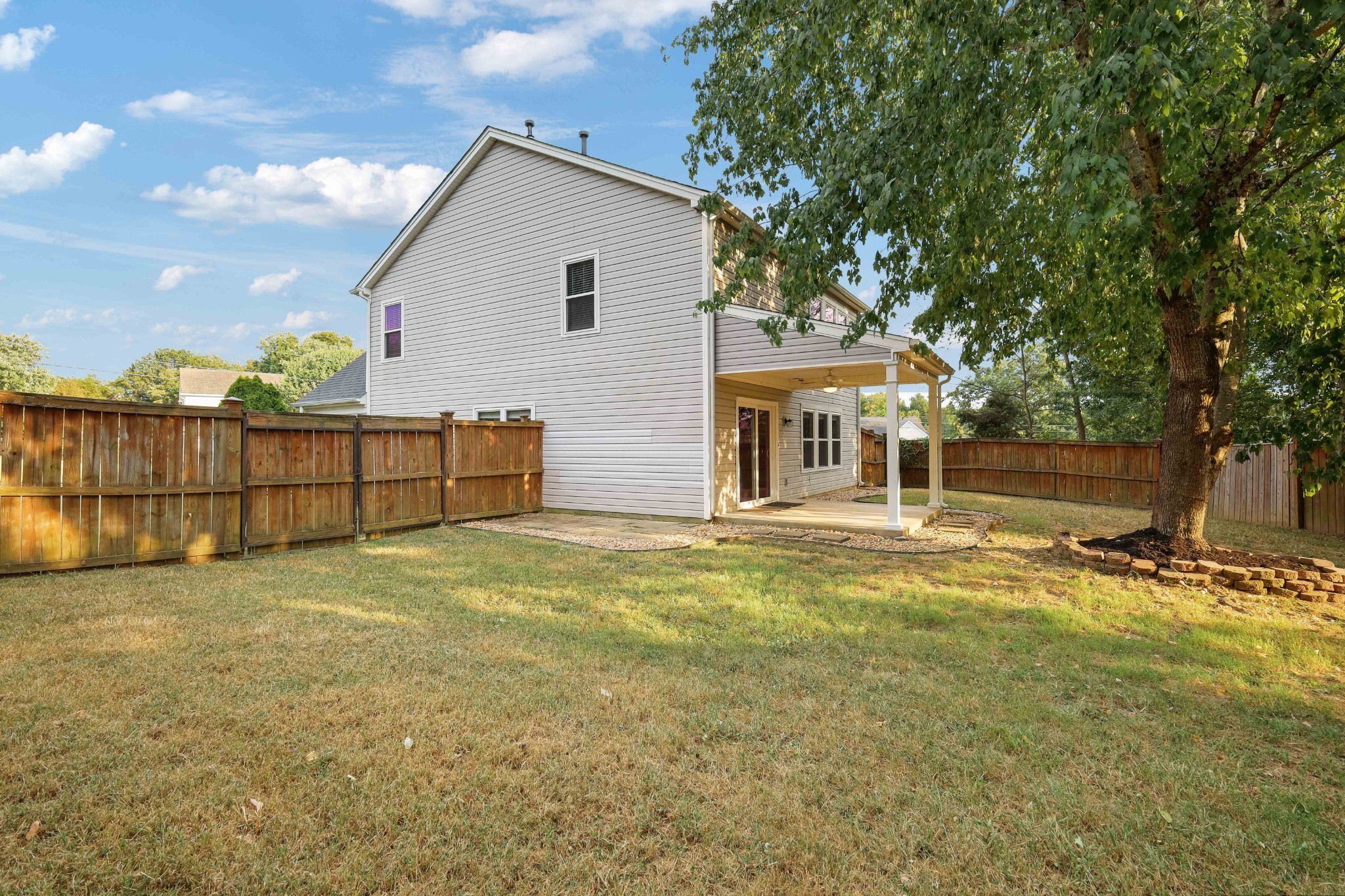 2201 Cardiff Lane Mount Juliet, TN 37122 - Photo 10 of 47 a view of a yard with a house and a large tree