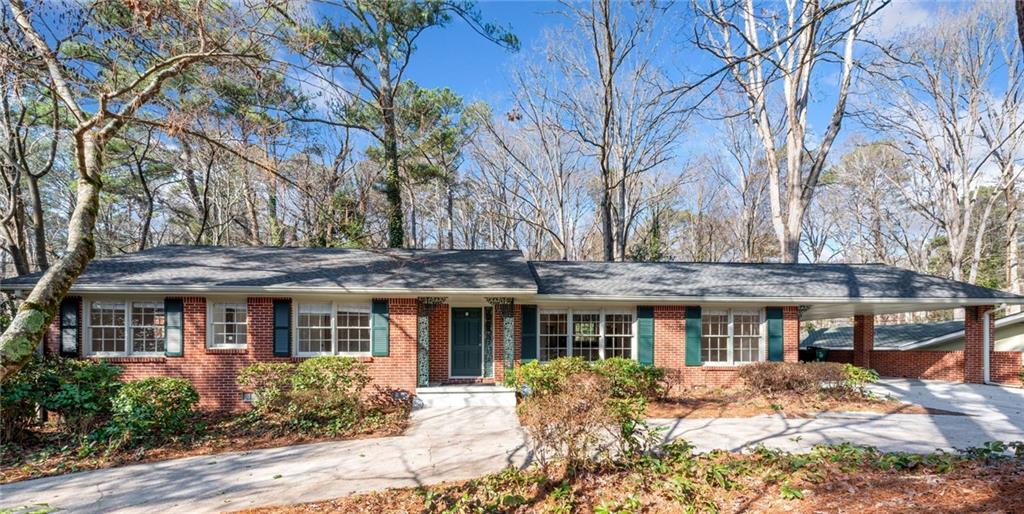 972 Houston Mill Road Northeast Atlanta, GA 30329 - Photo 1 of 1 Brick ranch with additional living space!