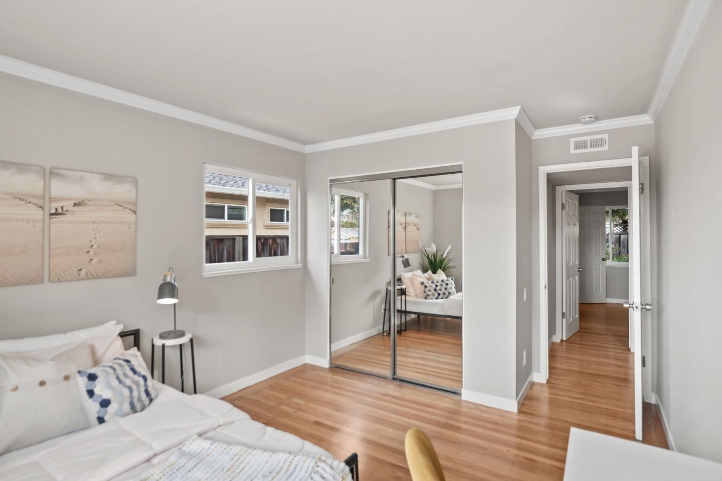 1001 Valley Forge Drive Sunnyvale, CA 94087 - Photo 14 of 24 a bedroom with a bed and wooden floor