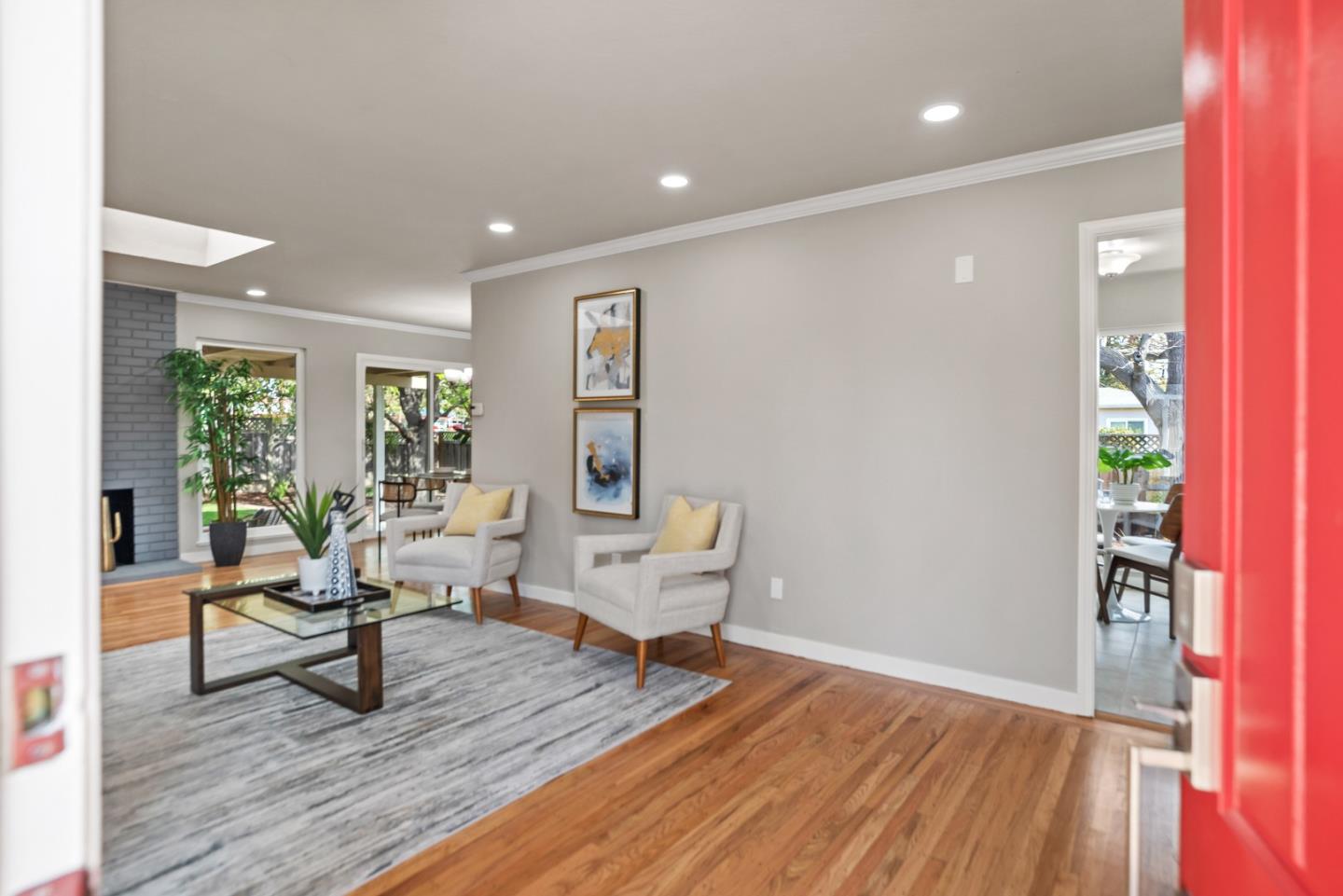 1001 Valley Forge Drive Sunnyvale, CA 94087 - Photo 2 of 24 a living room with furniture and a wooden floor