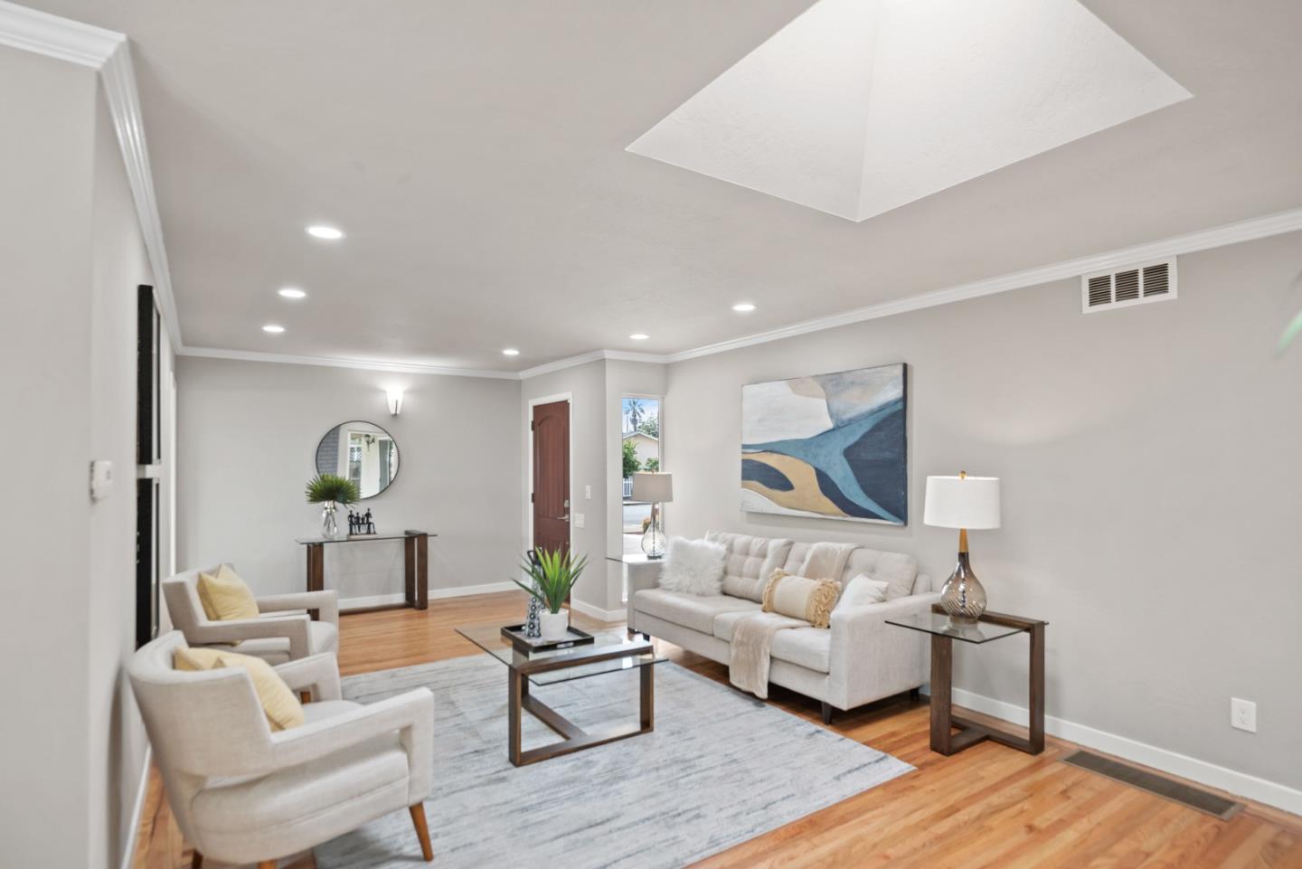 1001 Valley Forge Drive Sunnyvale, CA 94087 - Photo 4 of 24 a living room with furniture and a wooden floor
