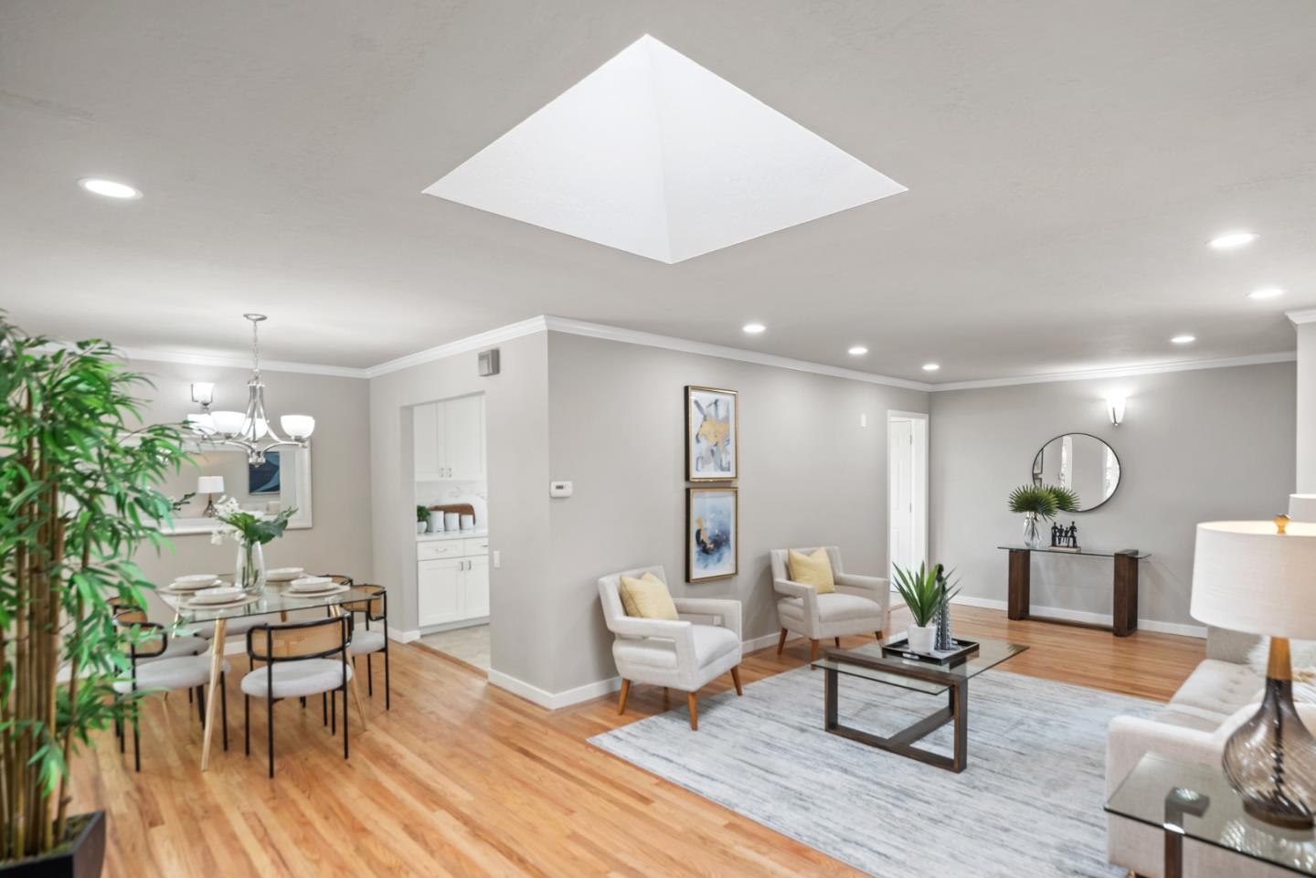 1001 Valley Forge Drive Sunnyvale, CA 94087 - Photo 5 of 24 a living room with furniture and a wooden floor