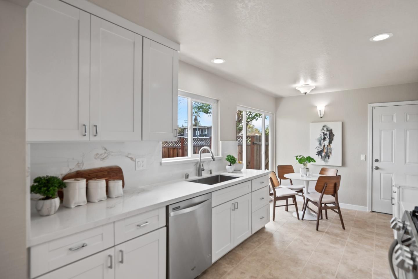 1001 Valley Forge Drive Sunnyvale, CA 94087 - Photo 9 of 24 a kitchen with a sink and cabinets