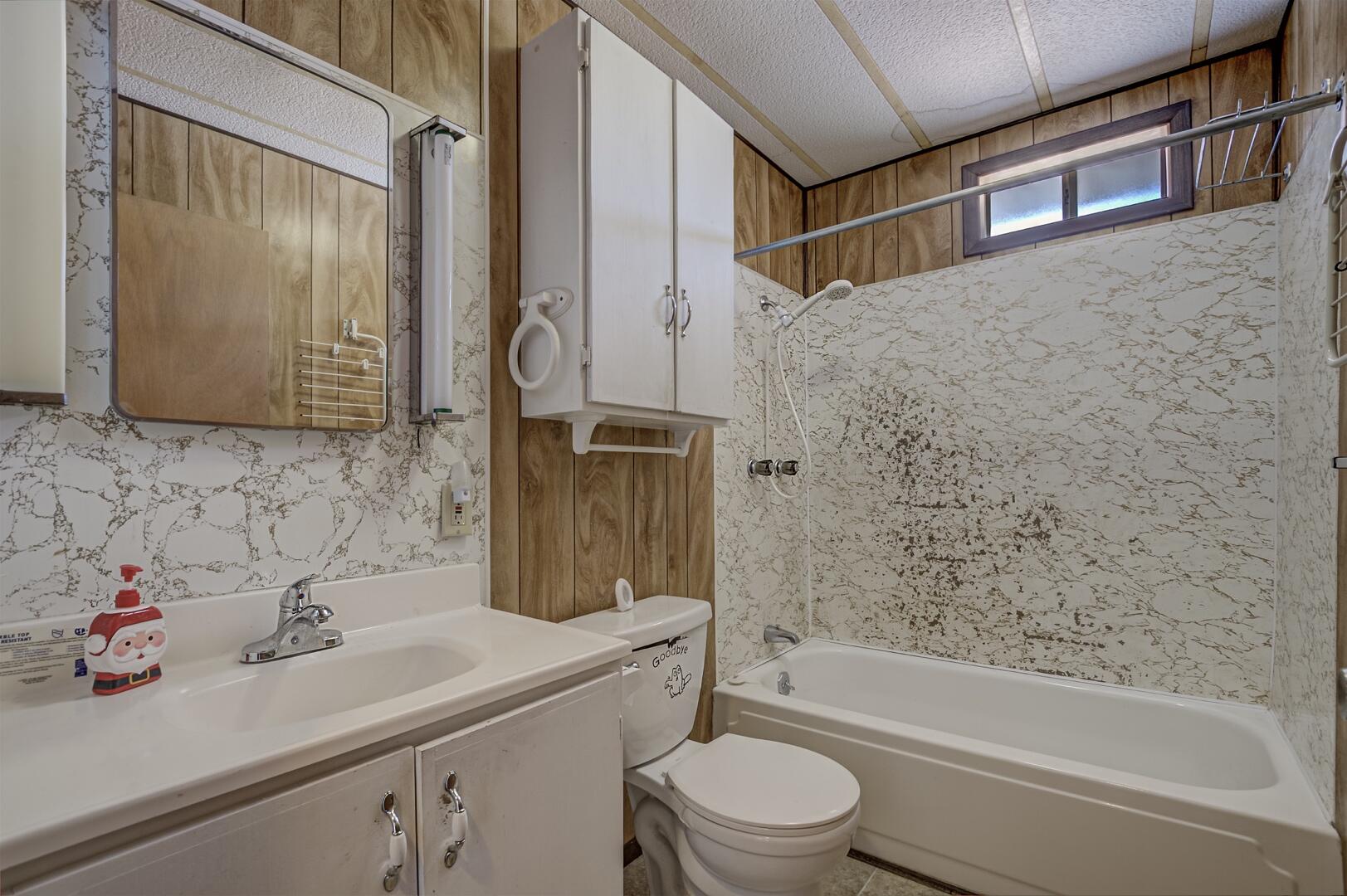 411 West Bridle Path Lane Payson, AZ 85541 - Photo 8 of 21 a bathroom with a sink a toilet and shower