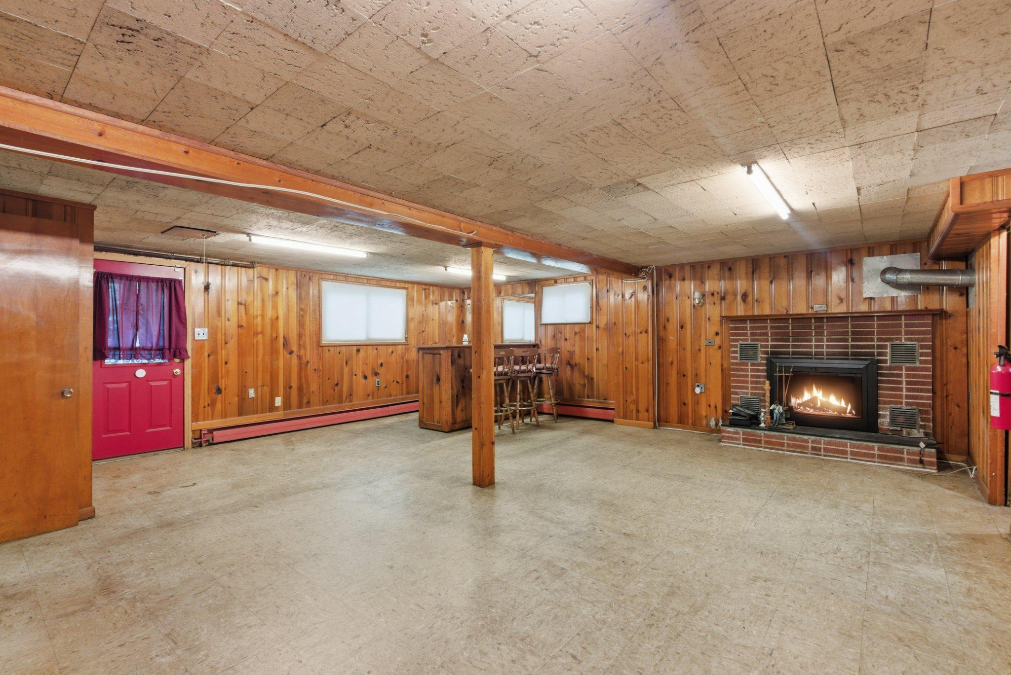 1110 Chillum Manor Road Hyattsville, MD 20783 - Photo 21 of 30 Finished basement with fireplace