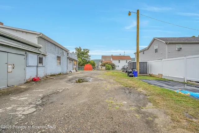 a view of backyard of house
