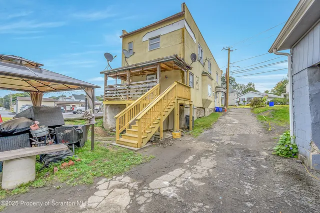 a view of a house with a park