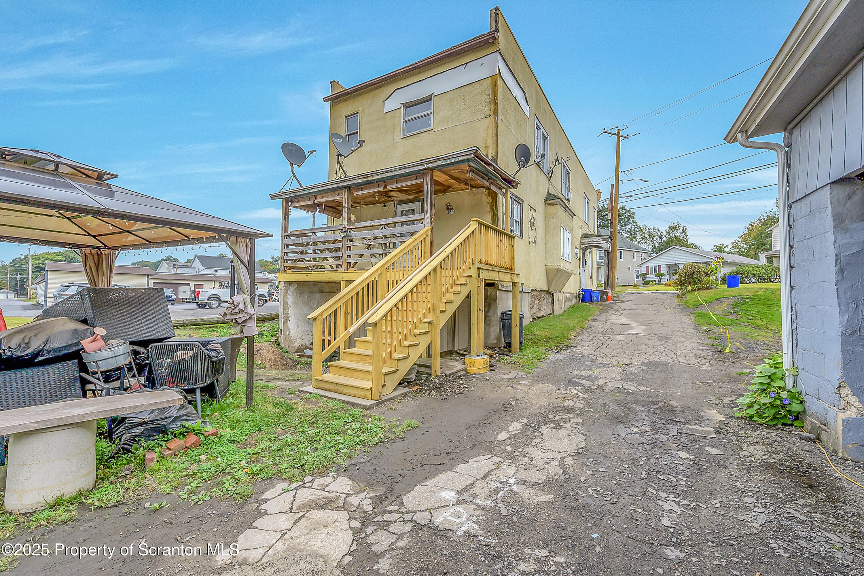 627 Main Street Duryea, PA 18642 - Photo 10 of 26 a view of a house with a park